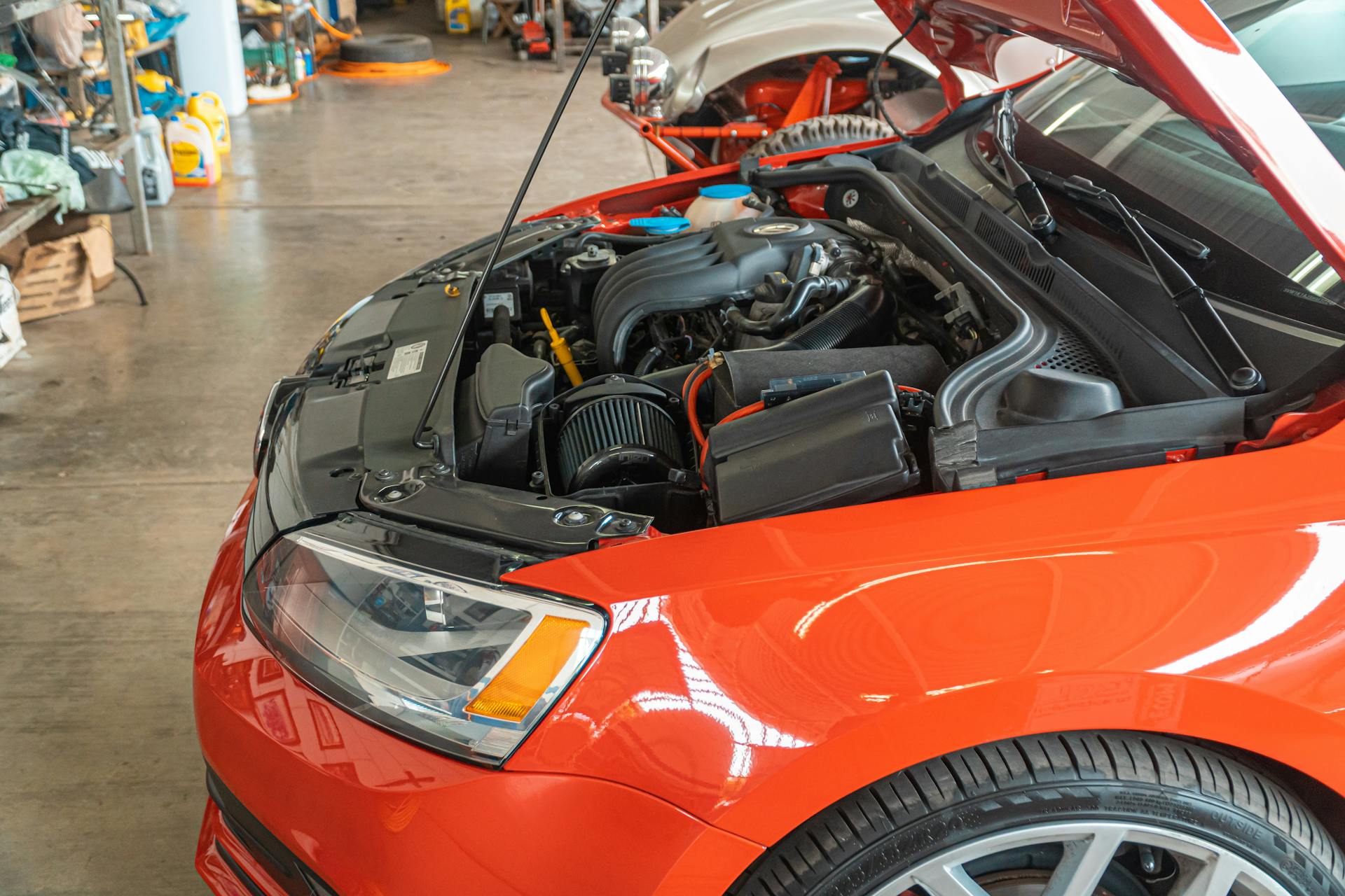 Vehicle with hood open for engine diagnostics at Pro Automotive Repair in Sachse TX
